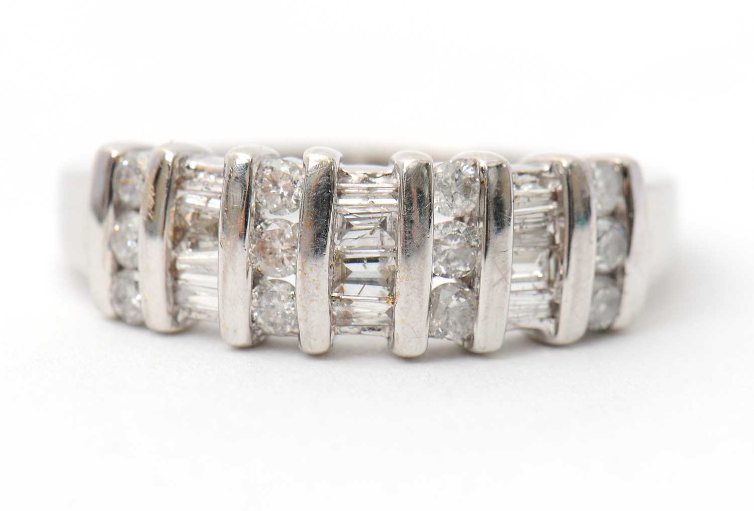 Lot 30 - A 9ct diamond ring, set with round brilliant...