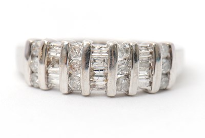 Lot 30 - A 9ct diamond ring, set with round brilliant...