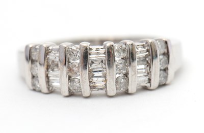 Lot 30 - A 9ct diamond ring, set with round brilliant...