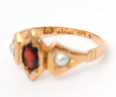 Lot 32 - A 15ct garnet and split pearl ring, with...