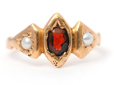Lot 32 - A 15ct garnet and split pearl ring, with...