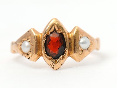 Lot 32 - A 15ct garnet and split pearl ring, with...