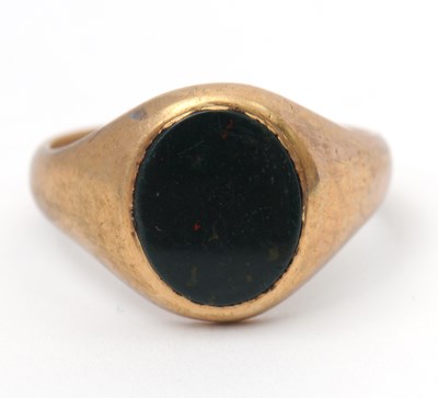 Lot 116 - A 9ct bloodstone ring, with oval inset...