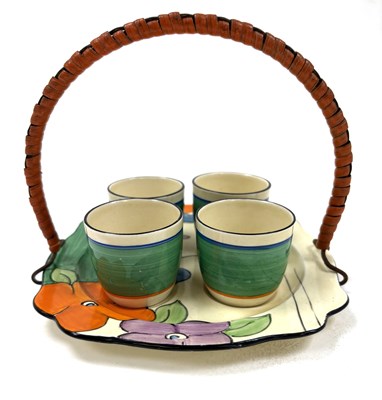 Lot 279 - A Clarice Cliff egg cup stand together with...