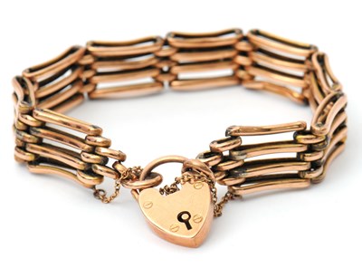 Lot 98 - A 9ct gate bracelet, the 13mm wide bracelet...