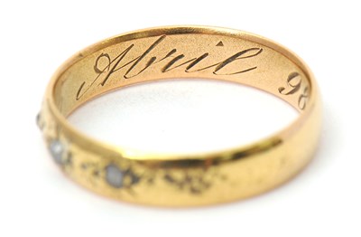 Lot 31 - A diamond ring, set with three small rose cut...