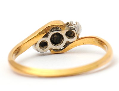 Lot 37 - A diamond ring, the crossover style ring with...