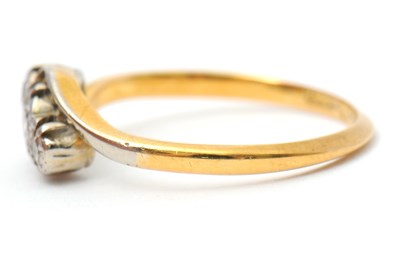 Lot 37 - A diamond ring, the crossover style ring with...