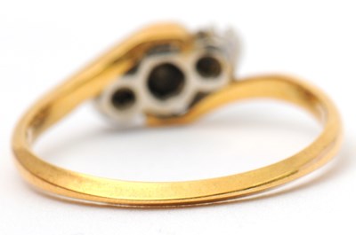 Lot 37 - A diamond ring, the crossover style ring with...