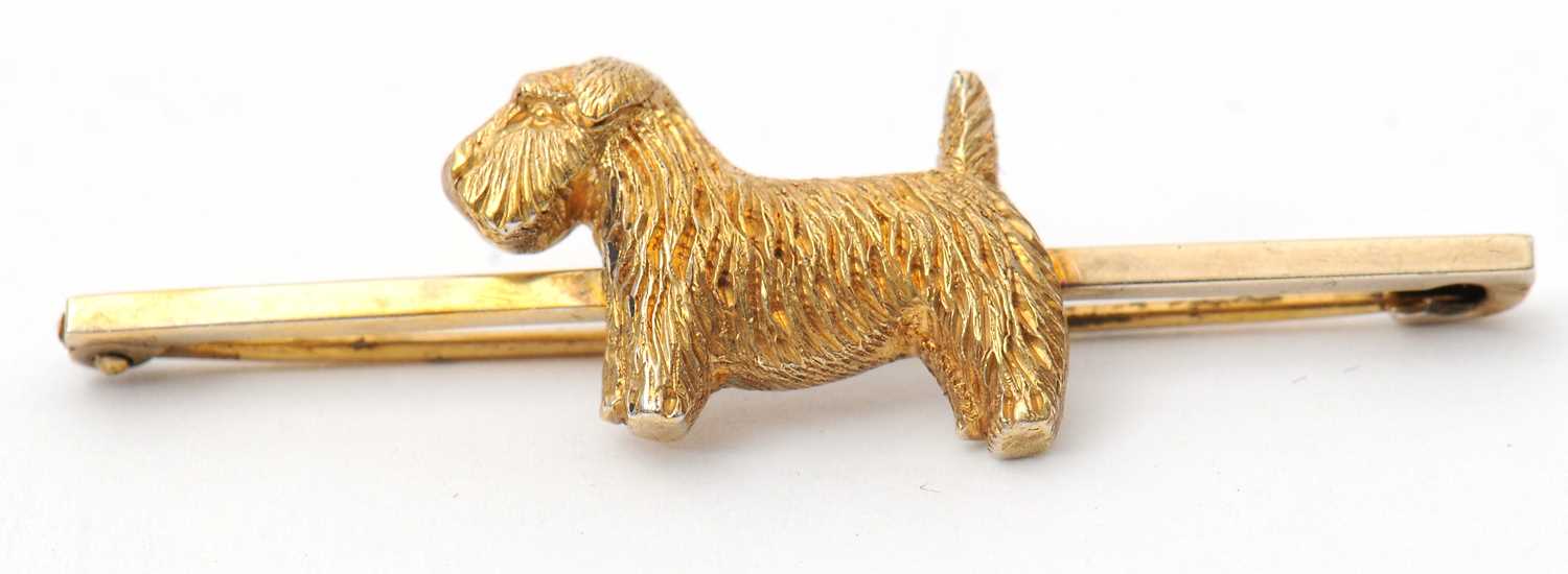 Lot 51 - A silver gilt terrier brooch, the...