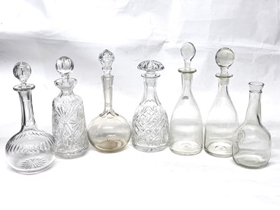 Lot 295 - Seven cut glass decanters, most with stoppers,...