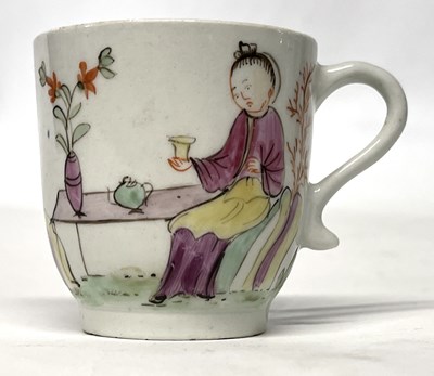 Lot 308 - A Lowestoft coffee cup with polychrome...