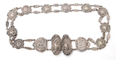 Lot 105 - A late Victorian cast silver buckled belt...