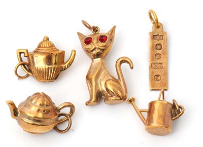 Lot 112 - Five assorted hallmarked 9ct charms, 4.9g