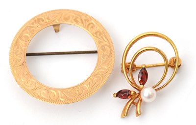 Lot 61 - Two brooches: to include a 9ct garnet and...