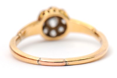 Lot 39 - A diamond ring, the small round cluster set...