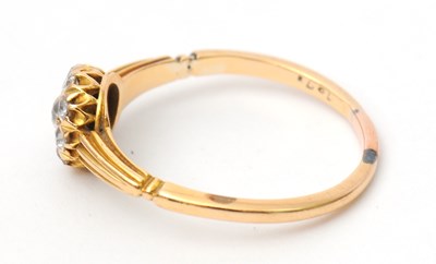 Lot 39 - A diamond ring, the small round cluster set...
