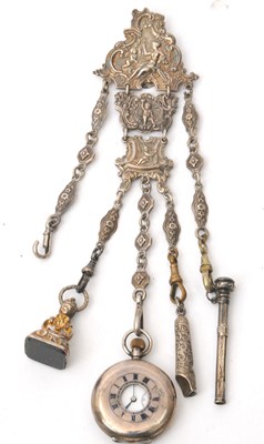 Lot 153 - A Victorian white metal chatelaine figural...