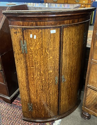 Lot 378 - A George III oak and mahogany cross banded...