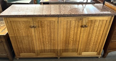Lot 413 - A bespoke oak and red granite topped four door...