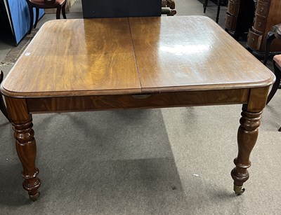 Lot 425 - A Victorian mahogany extending dining table...