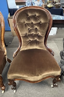 Lot 438 - A Victorian nursing chair with brown buttoned...