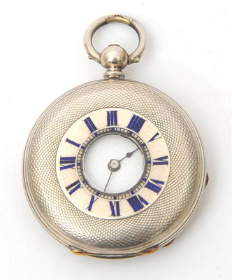 Lot 166 - A white metal half Hunter pocket watch stamped...