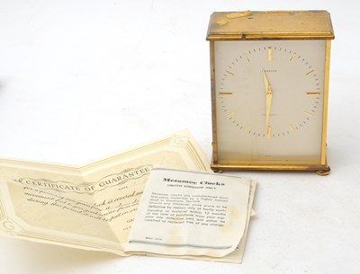 Lot 225 - A Garrard Precision clock with a silver...