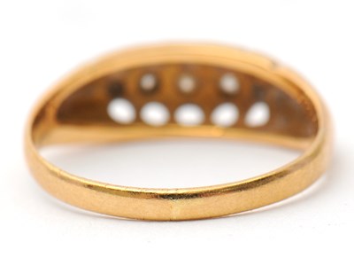Lot 15 - A five stone diamond ring, set with five small...