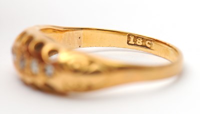 Lot 15 - A five stone diamond ring, set with five small...