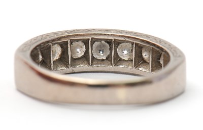 Lot 16 - A half eternity diamond ring, set with round...