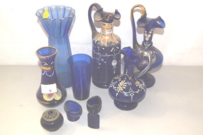 Lot 9 - A collection of various blue glass vases, jugs...
