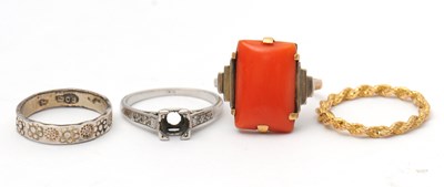 Lot 124 - Four rings: to include a rope twist style ring...