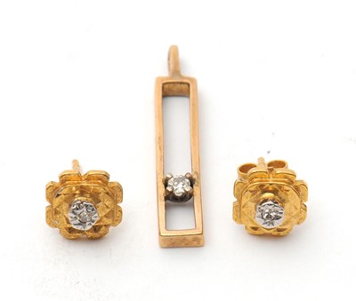 Lot 79 - A 9ct diamond pendant and earrings: the slim...