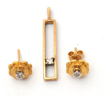 Lot 79 - A 9ct diamond pendant and earrings: the slim...