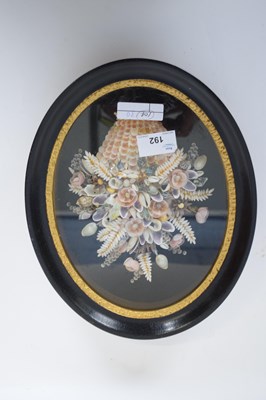 Lot 192 - Shell model of a basket of flowers in black...
