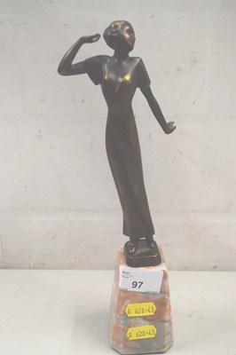 Lot 97 - A reproduction bronzed metal figure in the Art...