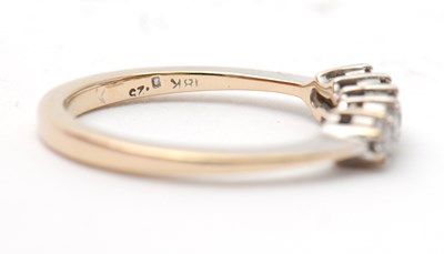 Lot 14 - An 18ct diamond ring, set with five round...