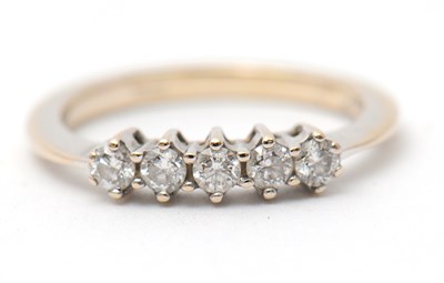 Lot 14 - An 18ct diamond ring, set with five round...