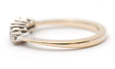 Lot 14 - An 18ct diamond ring, set with five round...