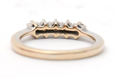 Lot 14 - An 18ct diamond ring, set with five round...