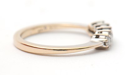 Lot 14 - An 18ct diamond ring, set with five round...