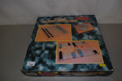 Lot 204 - A glass game set