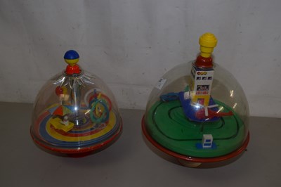 Lot 207 - Two spinning tops