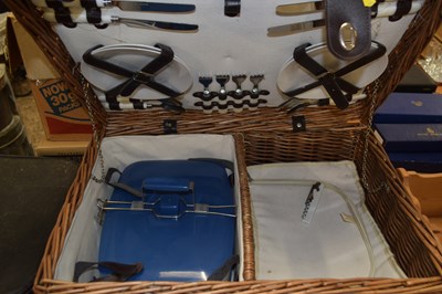 Lot 219 - A wicker picnic hamper and contents