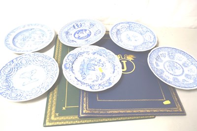 Lot 253 - Two gilt finish folders and a quantity of blue...
