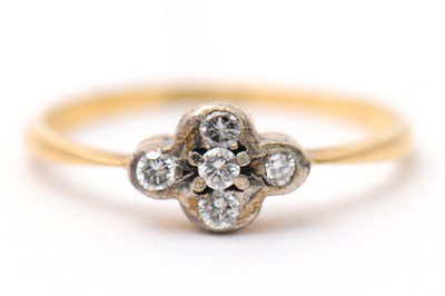 Lot 19 - A diamond ring, set with five small round...
