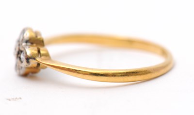 Lot 19 - A diamond ring, set with five small round...