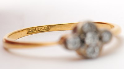 Lot 19 - A diamond ring, set with five small round...