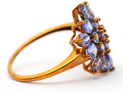 Lot 17 - A 9ct tanzanite cluster ring, the cluster...